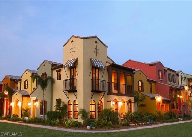 View of property with a residential view
