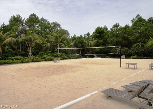View of community featuring volleyball court