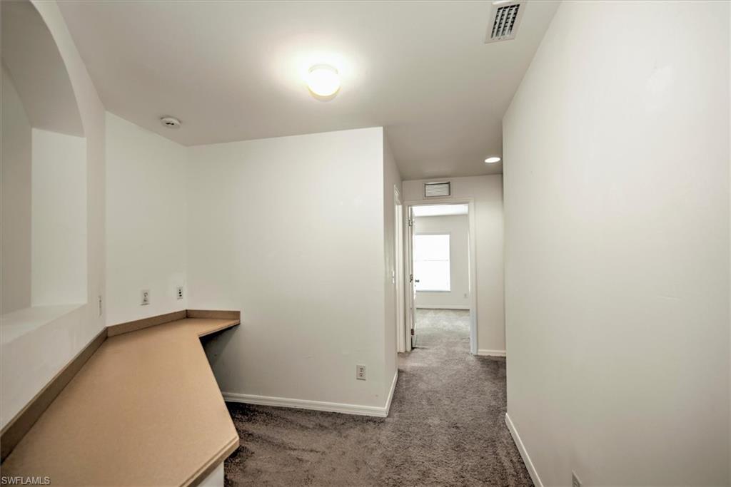Office area with carpet floors