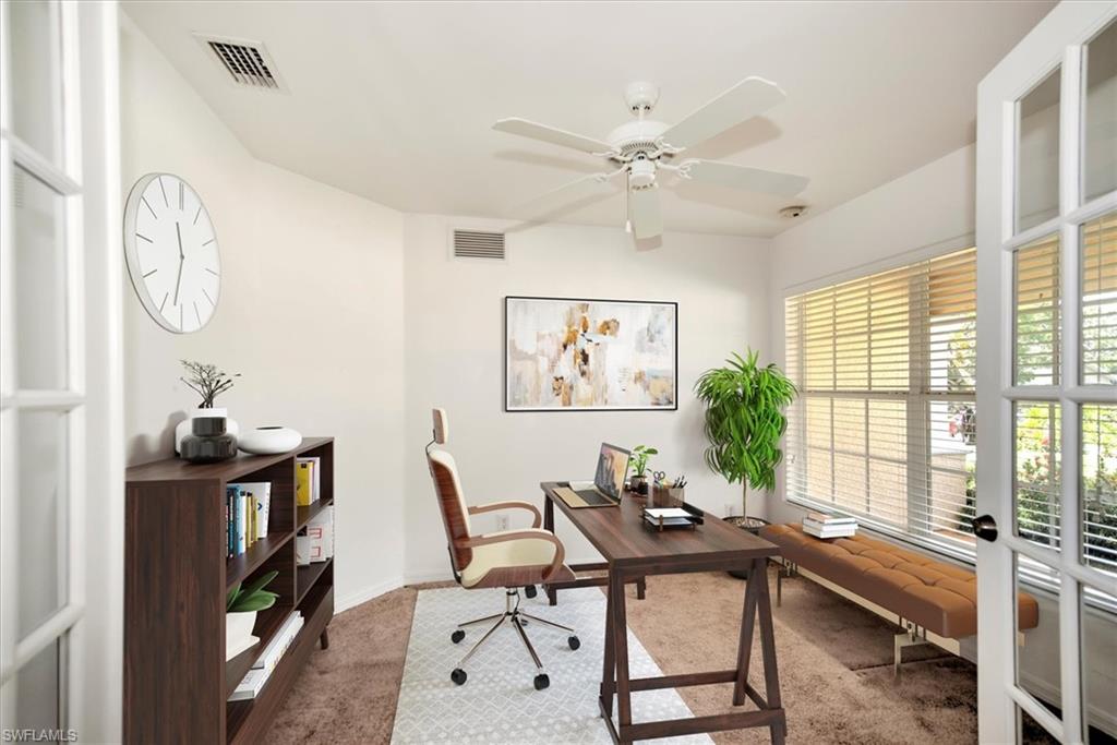 Office space Staged featuring carpet and ceiling fan