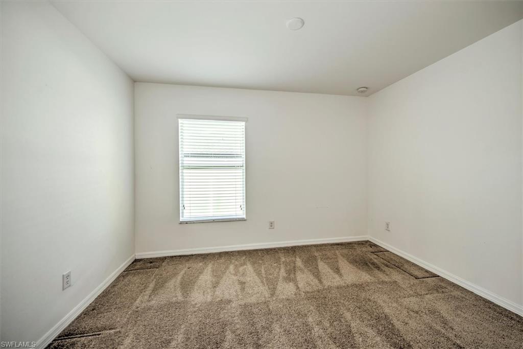View of carpeted 2nd bedroom