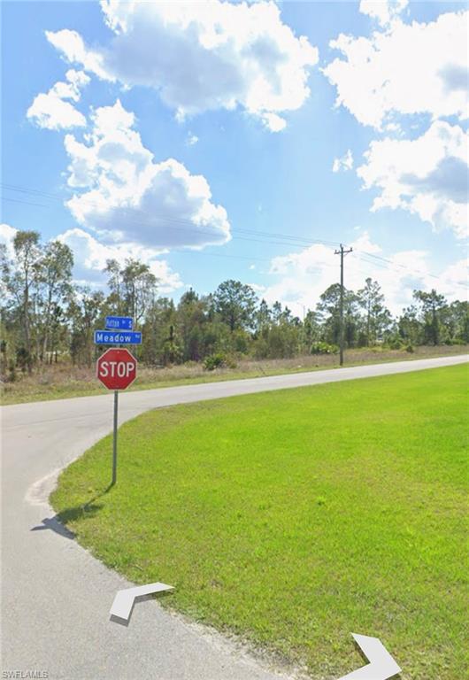 View of road with traffic signs