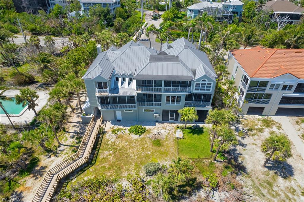 Rear of Property with private beach boardwalk