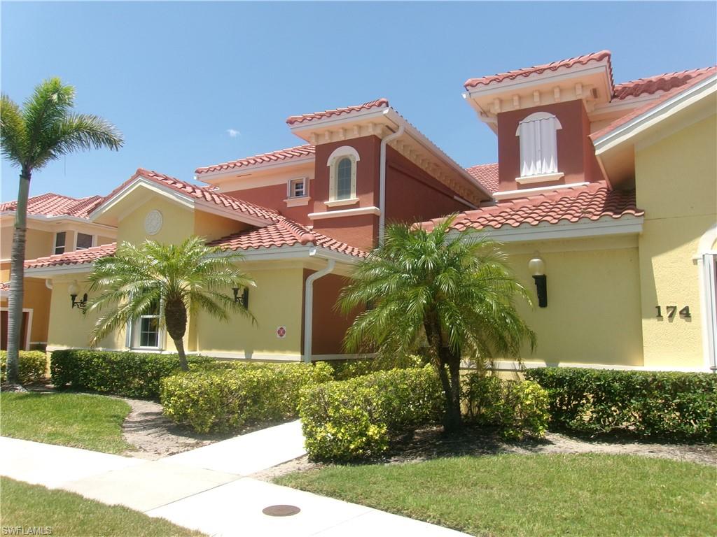 Mediterranean / spanish house with stucco siding and a tile roof