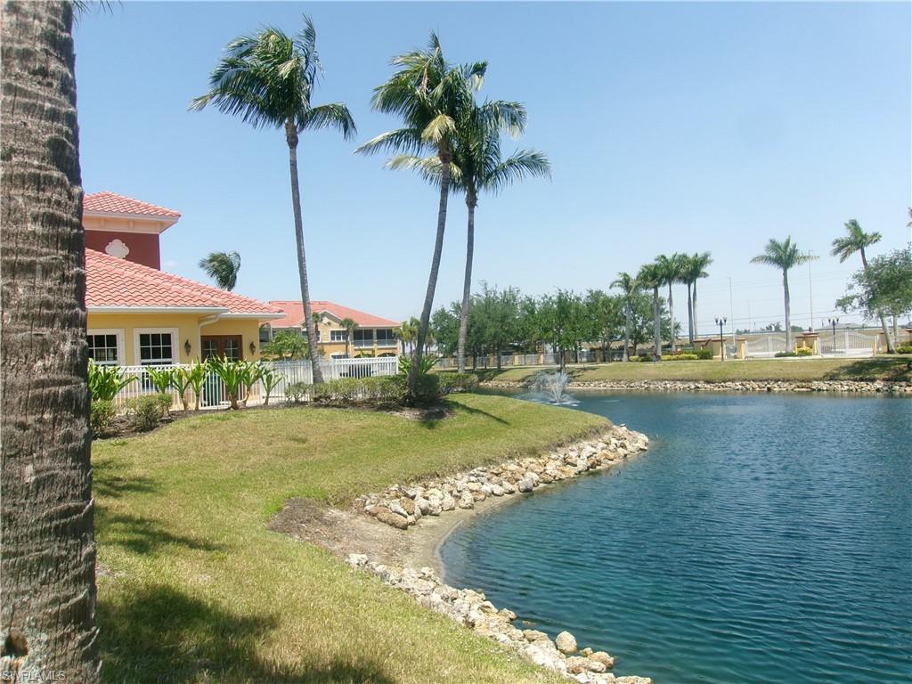 Property view of water featuring fence