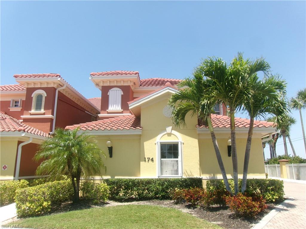 Mediterranean / spanish house featuring a tile roof and stucco siding