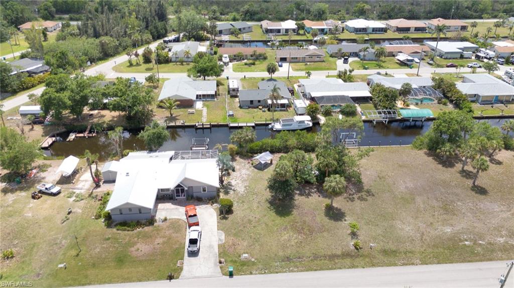 Bird's eye view featuring a residential view and a water view