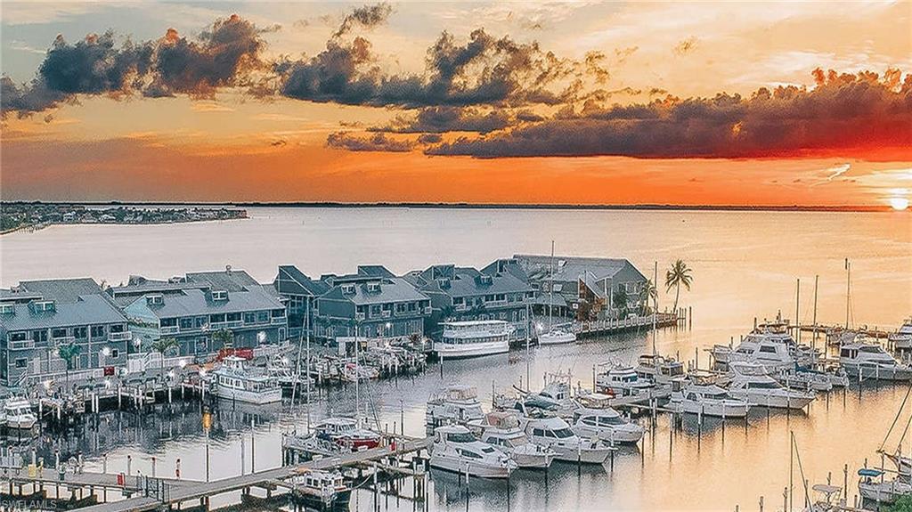 Property view of water featuring a boat dock