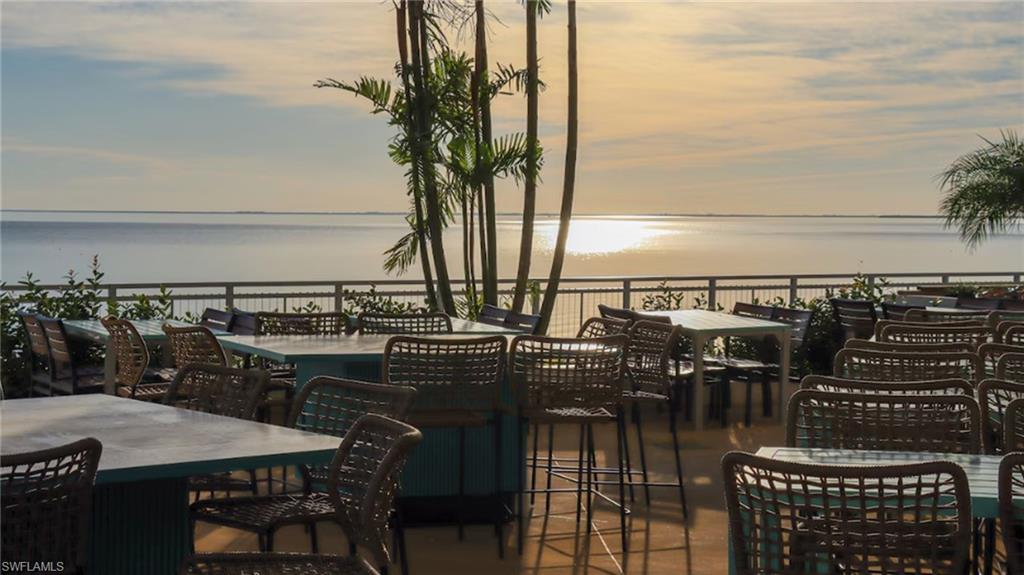 View of patio / terrace featuring outdoor dining area and a water view