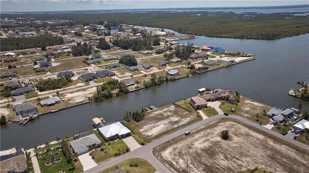 Bird's eye view with a residential view and a water view