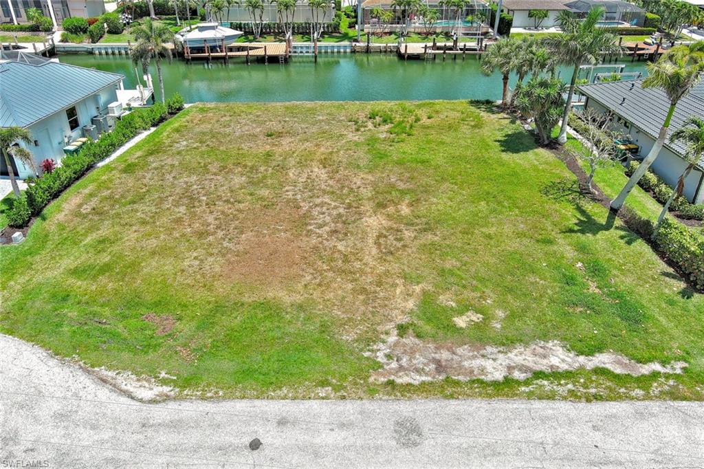 Bird's eye view with a water view and a residential view
