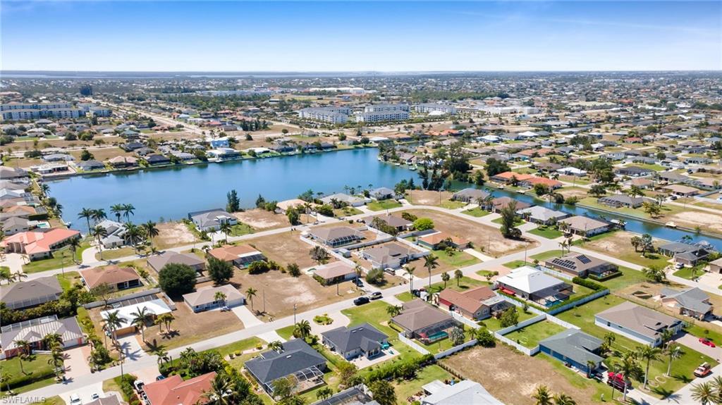 Bird's eye view with a residential view and a water view
