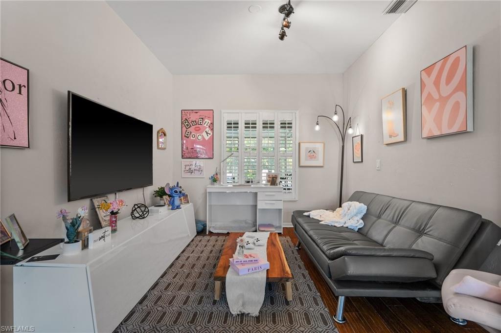 Living area with wood finished floors