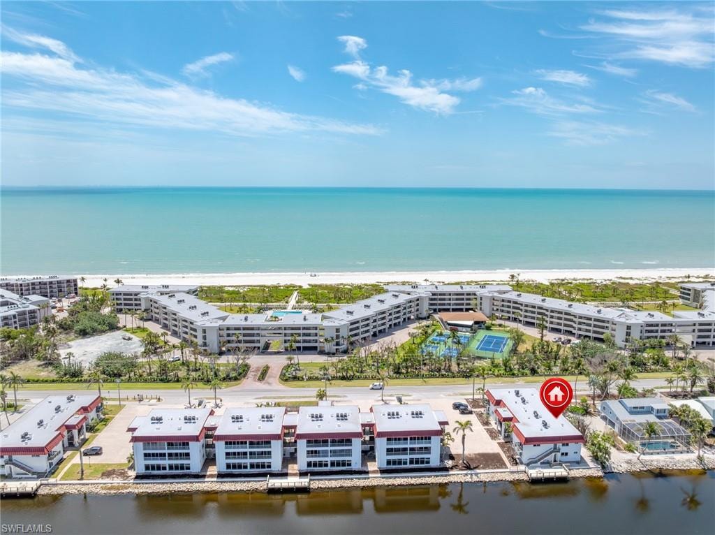 Aerial view featuring a water view