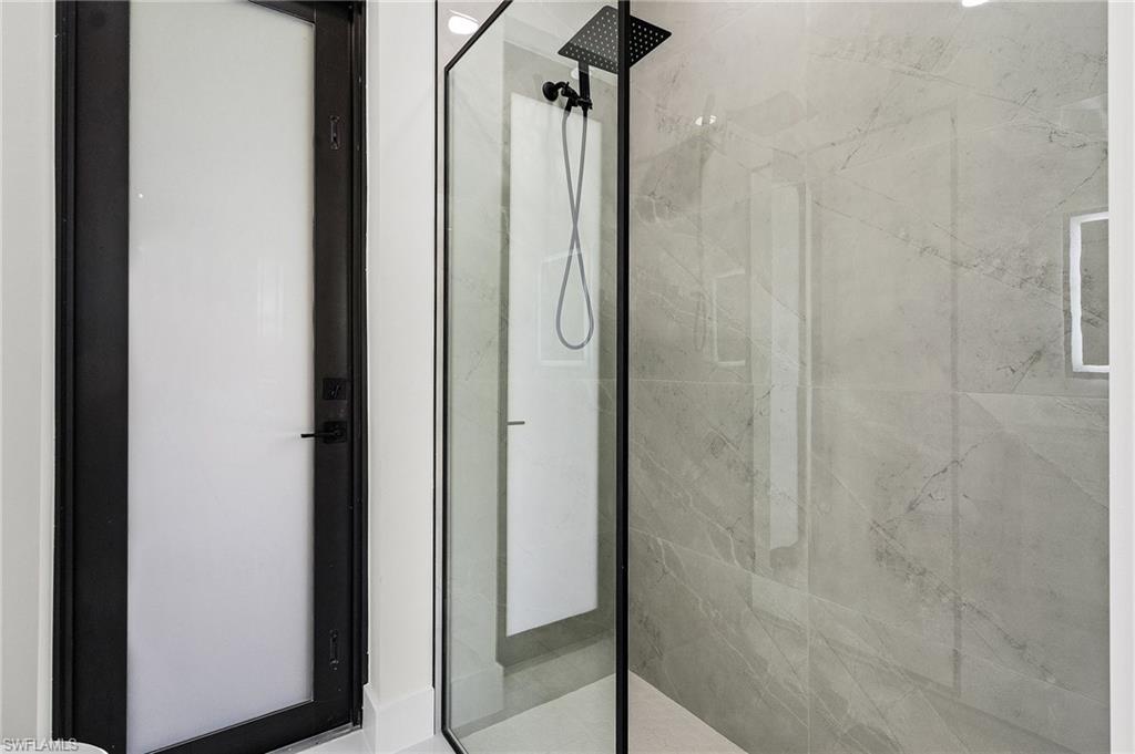 Pool bathroom with tiled shower