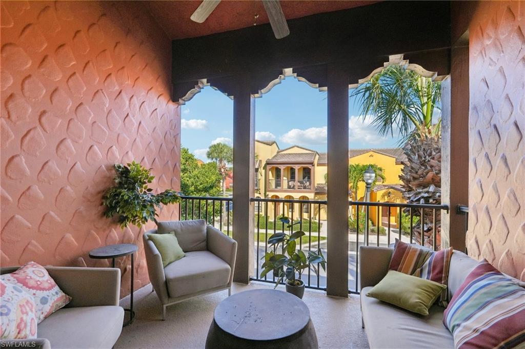 Balcony featuring a ceiling fan