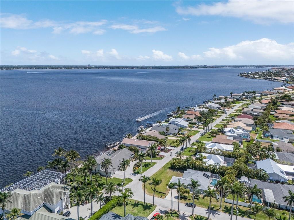 Aerial view with the wide Caloosahatchie River at your back door looking across to Ft Myers and to the South toward Sanibel and Captiva