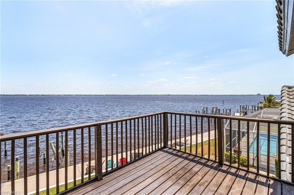 Wooden terrace with a River view and used year round due to South Eastern exposure