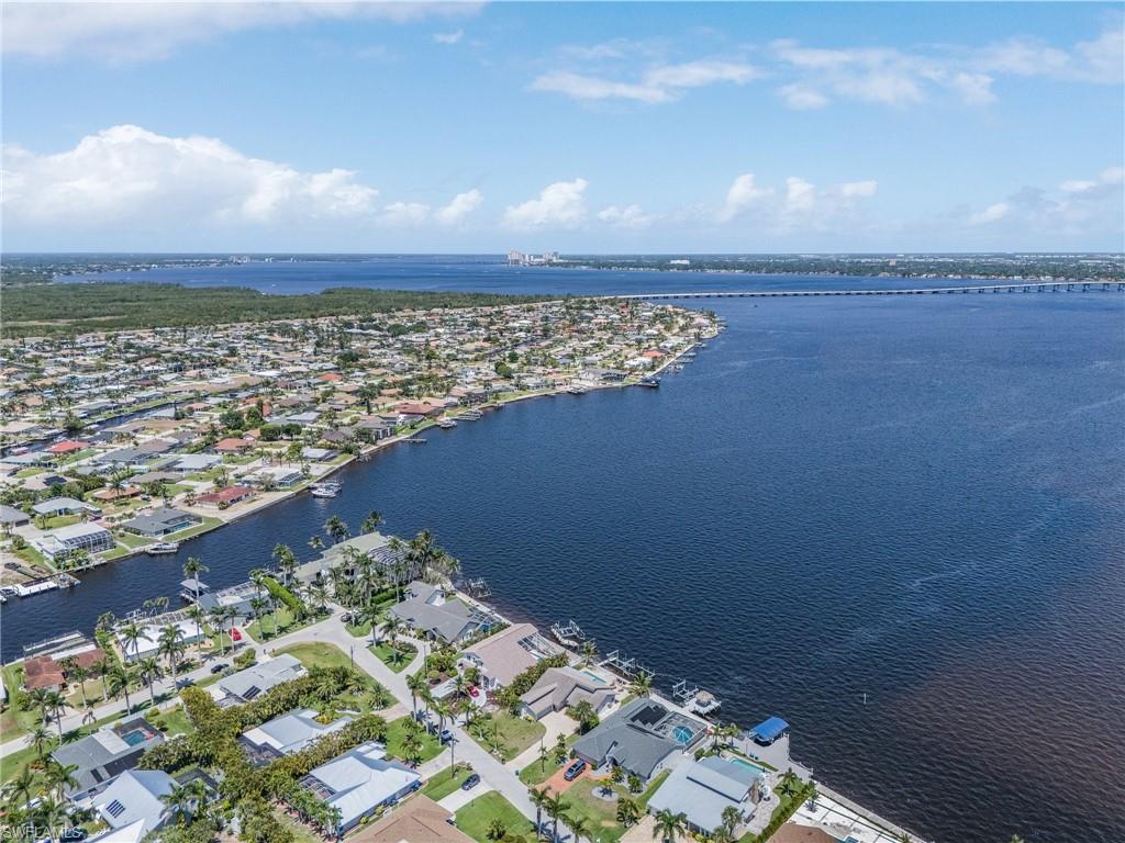 Bird's eye view with a water view and a residential view You will enjoy the privacy of this oversized lot with lots of room to roam