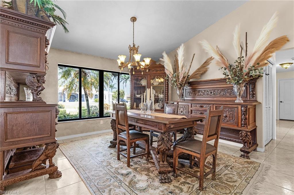 Dining area featuring vaulted ceiling and lots of natural light