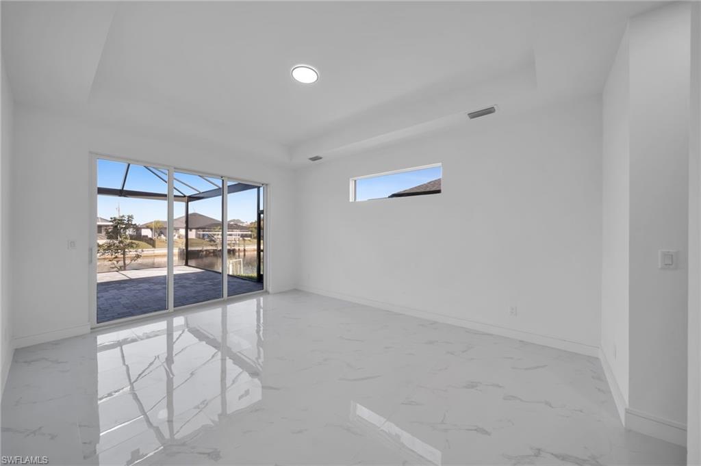Hall featuring recessed lighting, marble finish floor, and baseboards