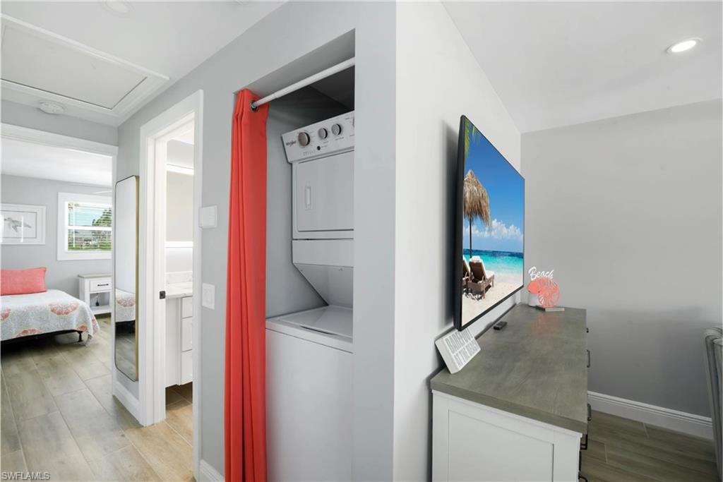 Functional laundry space with ample storage (Beach home 1) - Virtually Edited Image