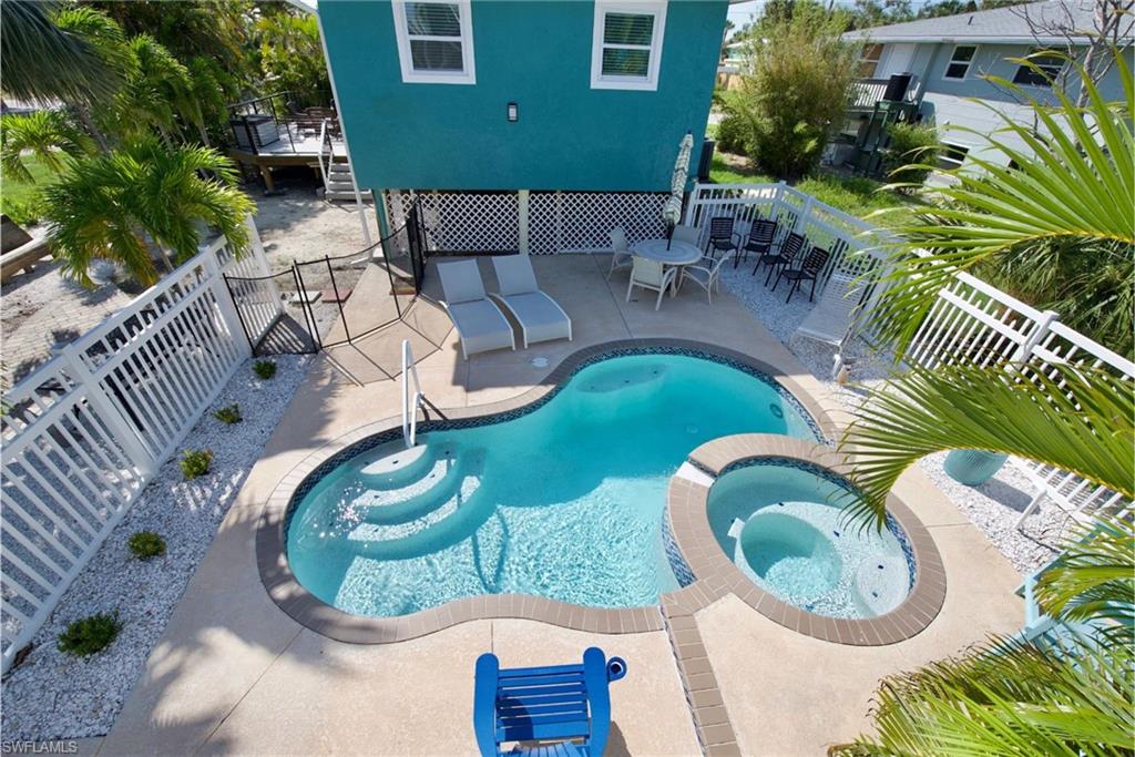 Enjoy poolside relaxation in your own private oasis  - Virtually Edited Image