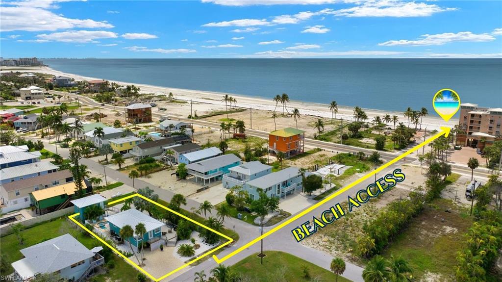 Aerial view showcasing beach access  - Virtually Edited Image
