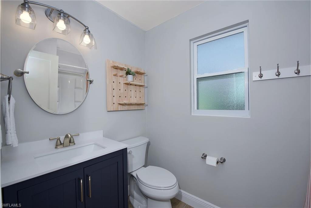 Bathroom with vanity and toilet (Beach home 2)