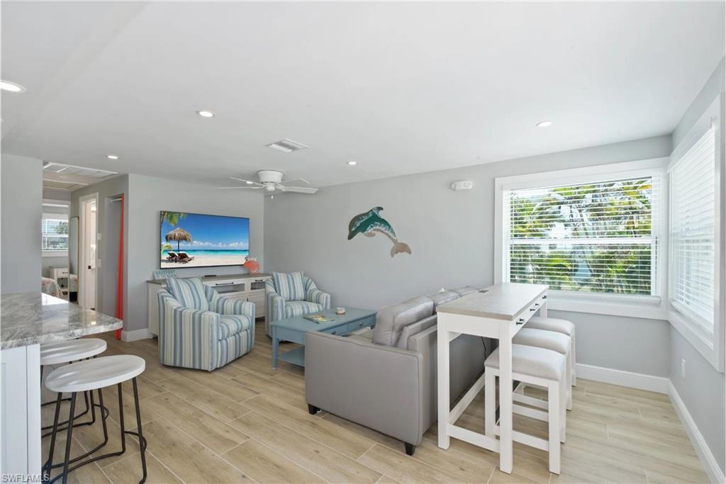 Open living space perfect for entertaining guests (Beach home 1) - Virtually Edited Image