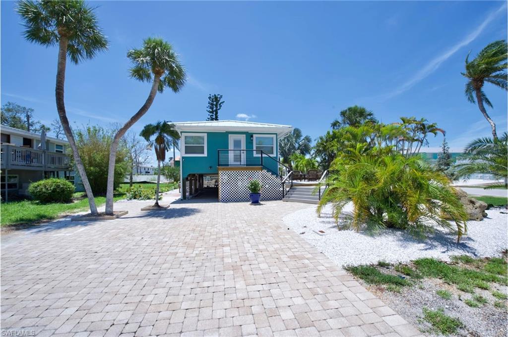 Beach home 1: Charming home ideally located near the sandy shores - Virtually Edited Image