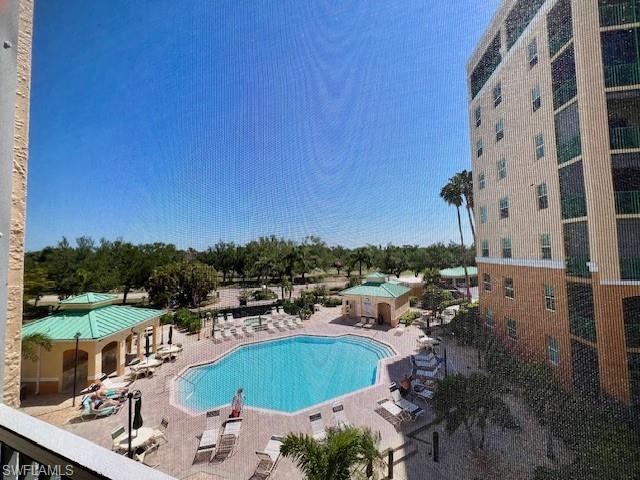 View of swimming pool with a patio area