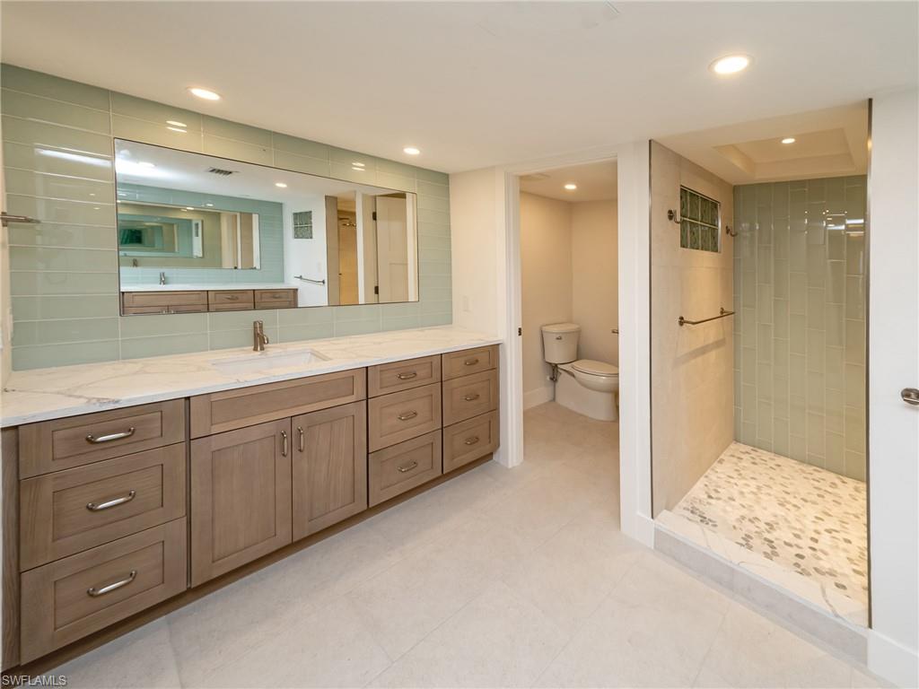 Primary bathroom and one of its two vanities