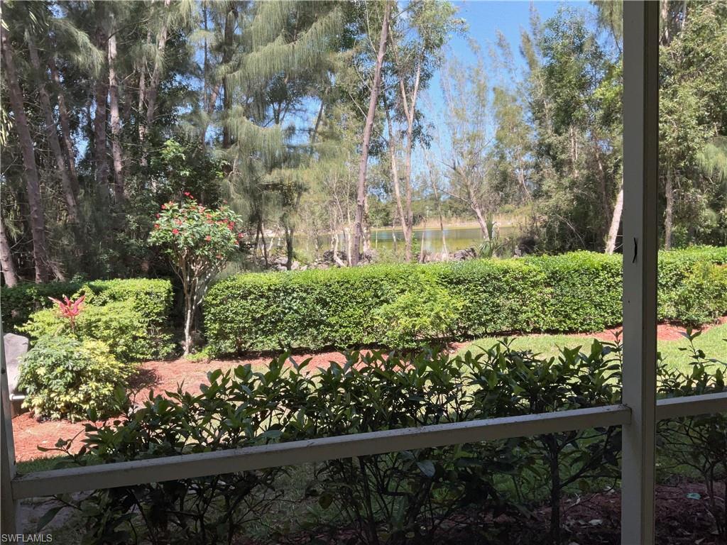 View of yard with a water view