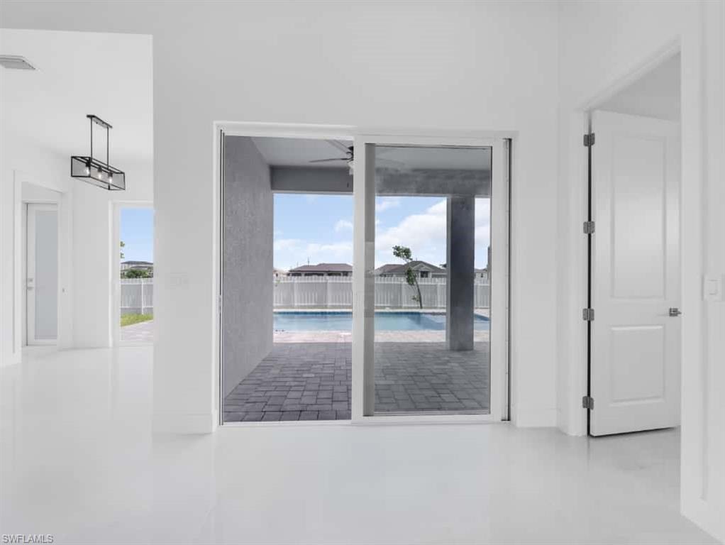Unfurnished room featuring a ceiling fan