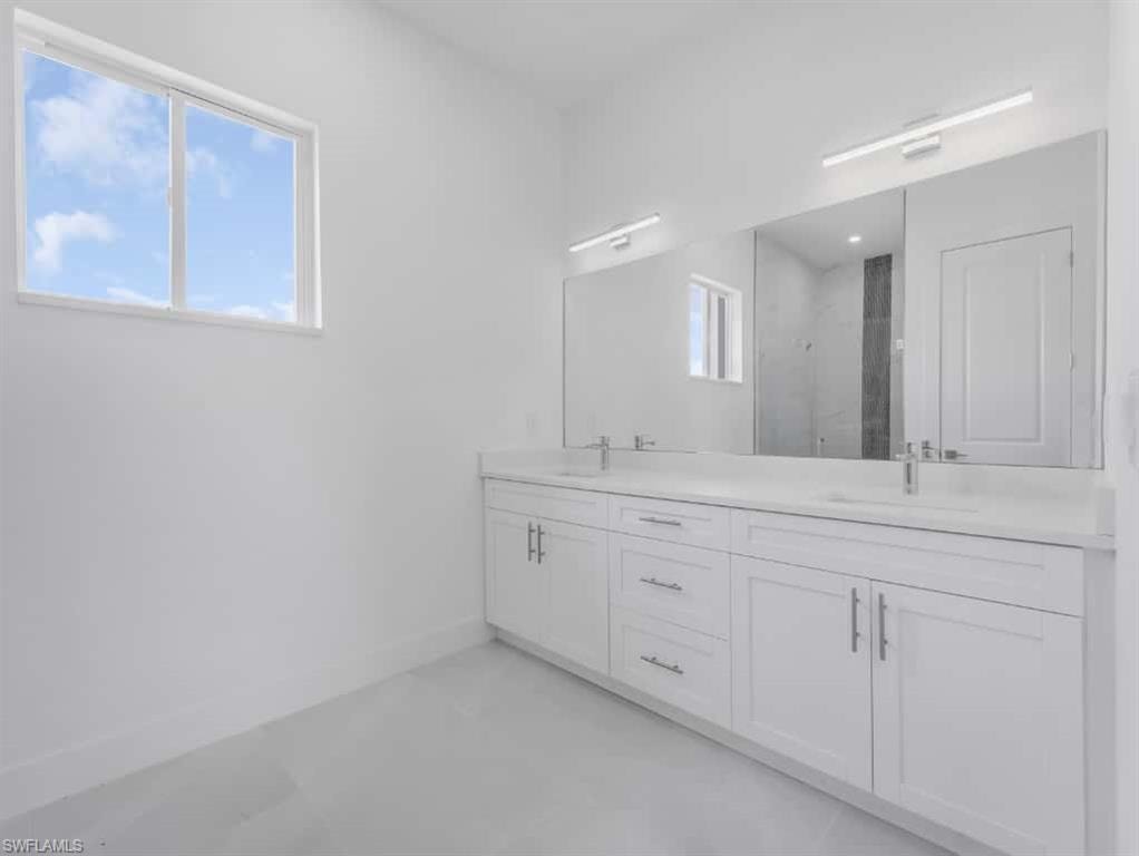 Bathroom with a tile shower