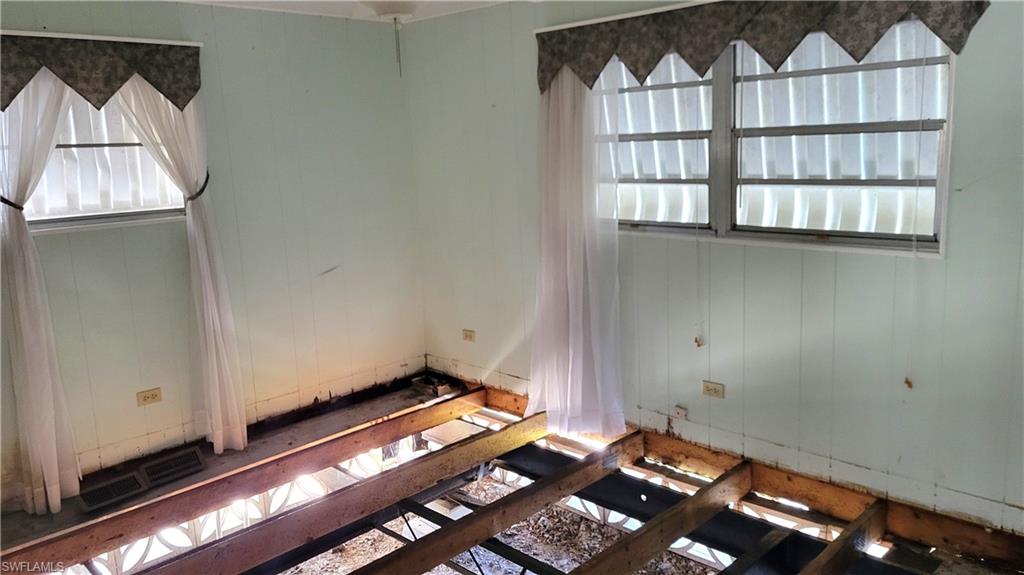 Empty room with visible vents
