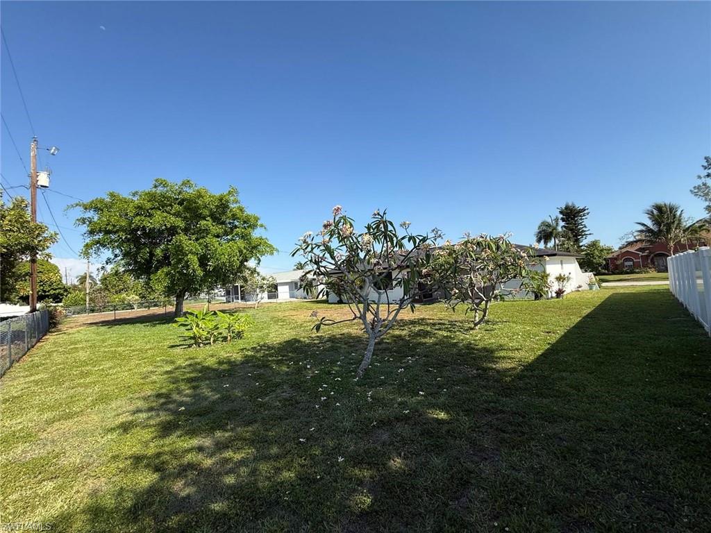 View of yard with fence