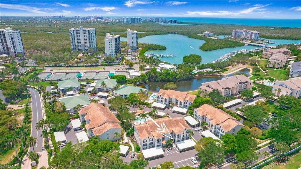 View of property location with a nearby body of water, nearby urban area, and nearby suburban area