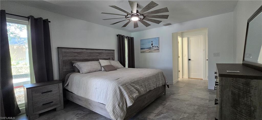 Bedroom featuring a ceiling fan