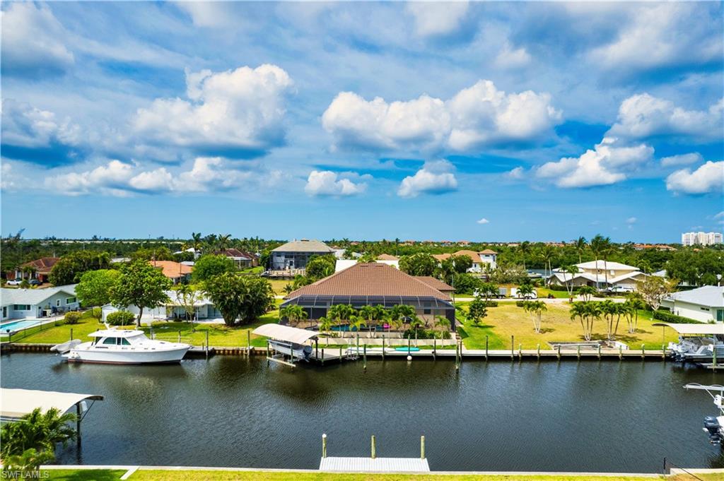 Water view featuring nearby suburban area