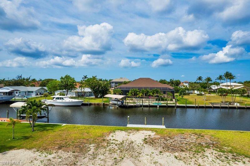 Water view featuring nearby suburban area