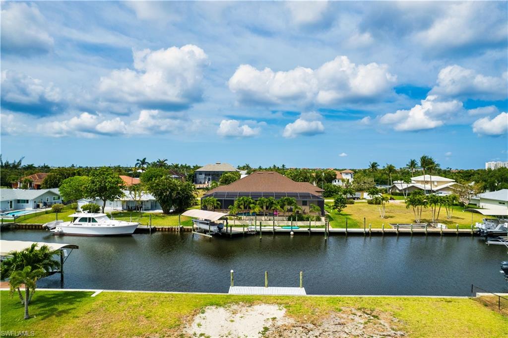 Water view with nearby suburban area