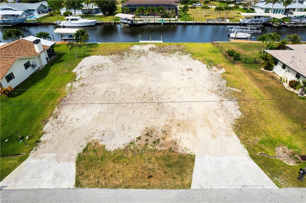 Aerial view of residential area with a nearby body of water