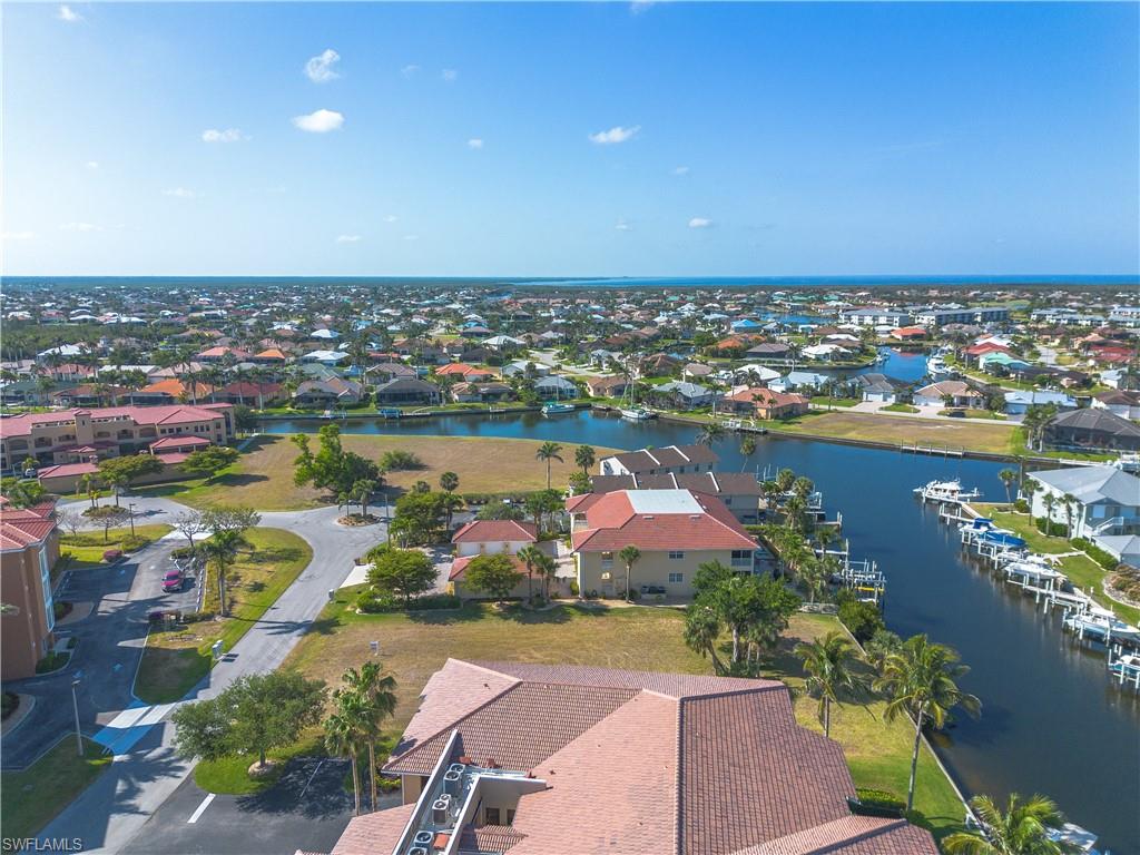 Aerial view of residential area with a large body of water