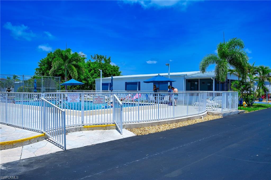 Community pool with a patio area