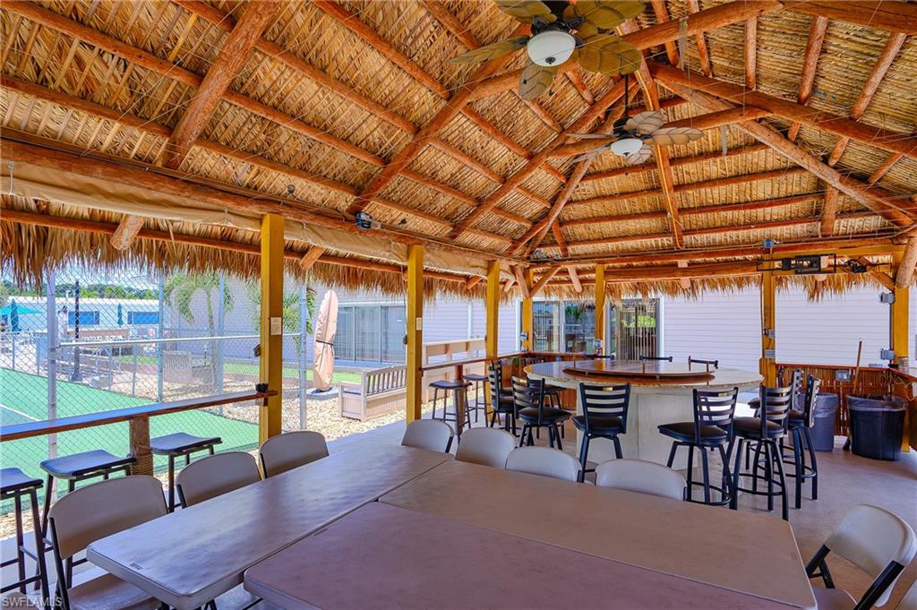 Sunroom with vaulted ceiling and plenty of natural light