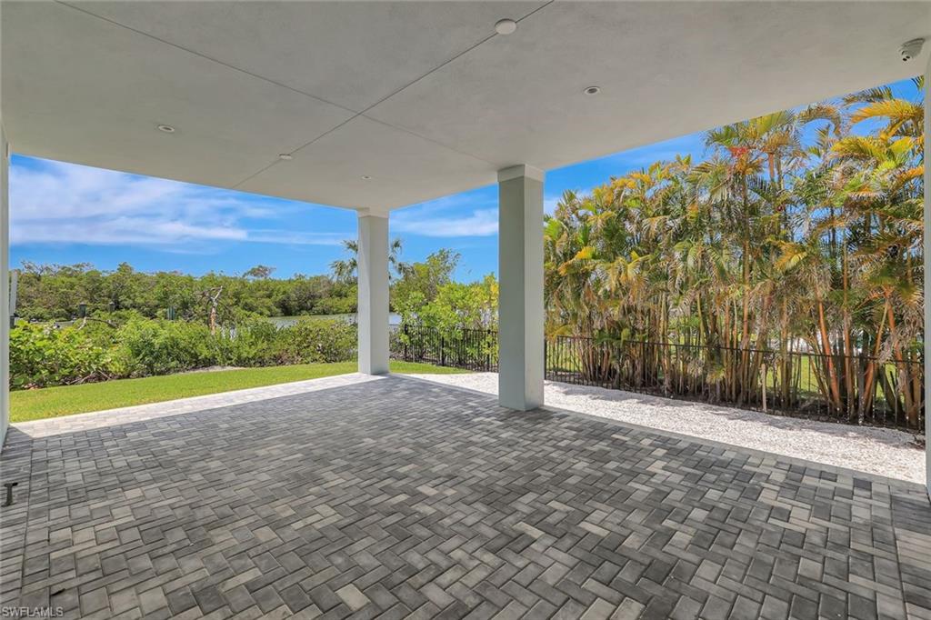 View of patio with fence