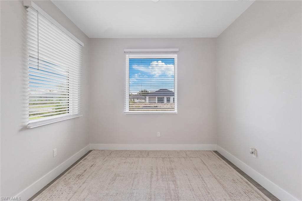 Spare room featuring plenty of natural light