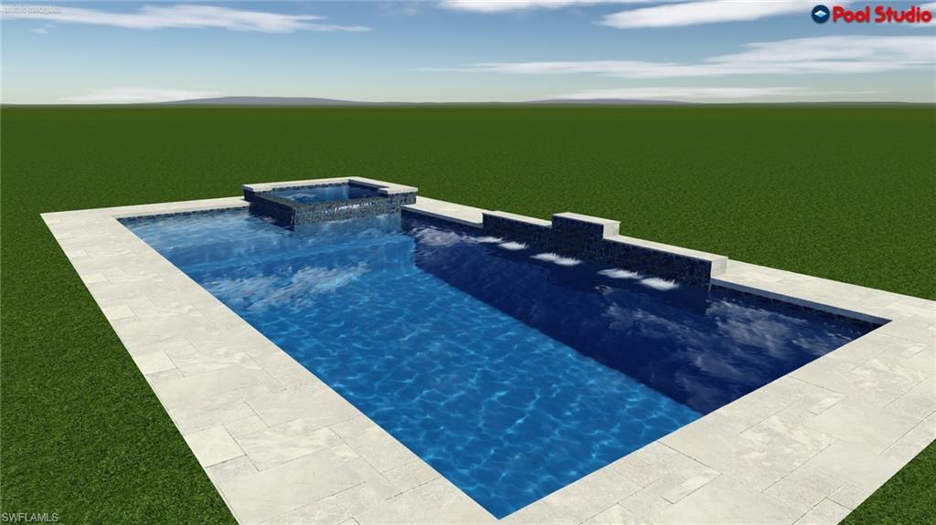 View of pool featuring a pool with connected hot tub and a mountain view
